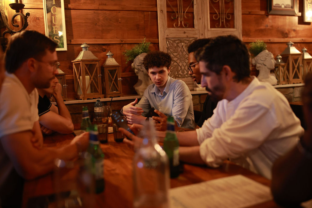 Founders sharing ideas over a table at a JN Network event in Toronto